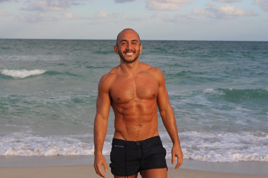 Ripped man at the beach