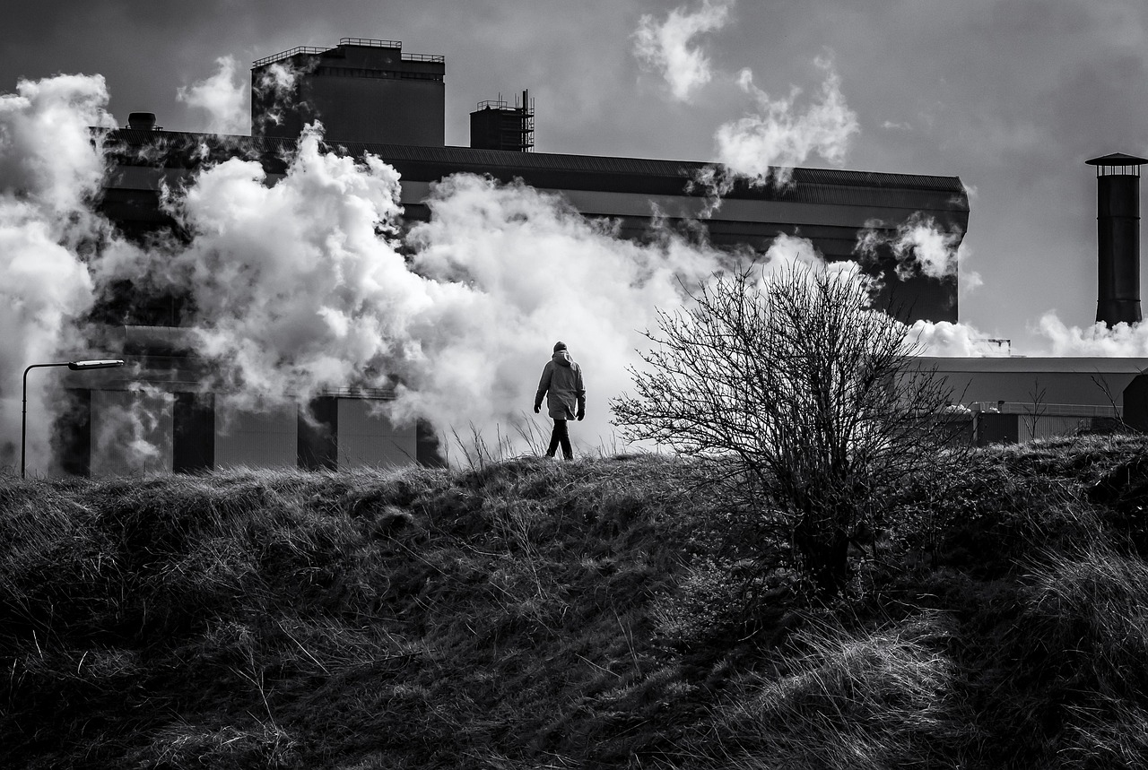 Man walking in smog and pollution